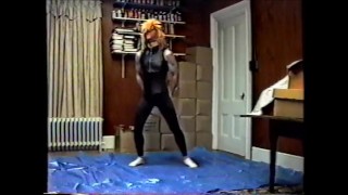 wearing black tights & crop top, stocking mask & wig hump air pillow 1990's