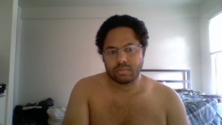 seated at my desk in front of my computer