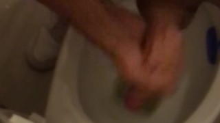 Cuban teen playing with his dick in toilet