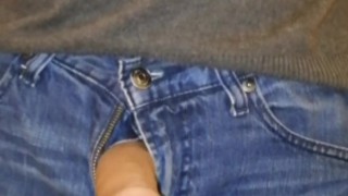 Uncircumsized cock taken out of jeans and stroked