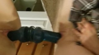 Wife stuffs her holes with big blue dildo