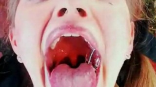 Crazy slutty teen opens mouth, crosses, eyes, and gags on dildo. AMAZING!!