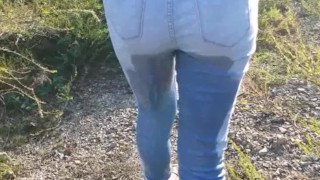 Walking and pissing my pants on the side of the road.