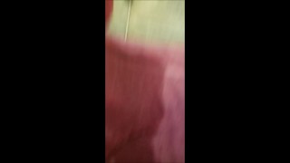 Caged black cock pissing wearing panties