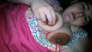 Plus size girl plays with her big tits