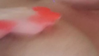 Natasha sucks her own tits while masturbating