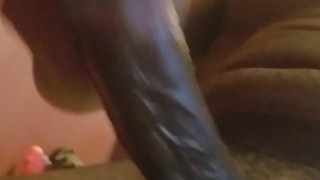 Big black shinny dick! Look at the veins!
