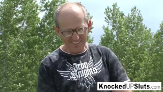 Knocked up slut takes care of a cock outdoors