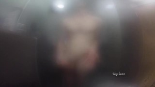 Twink jerks off and presses cock against glass in steamy shower session