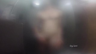 Twink jerks off and presses cock against glass in steamy shower session