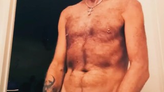 Getting naked and playing in front of the camera