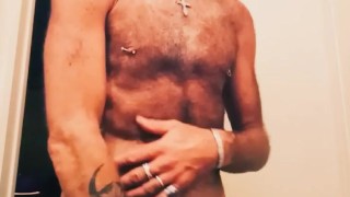 Getting naked and playing in front of the camera