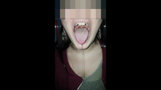 Girl huge mouth and long tongue spit