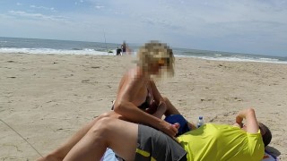 REAL AMATEUR PUBLIC HANDJOB RISKY ON THE BEACH !!! PEOPLE WALKING NEAR...