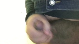 Jerking it in a dirty bathroom stall while some guy takes 