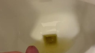 Pissing and jerking in public urinal