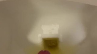 Pissing and jerking in public urinal