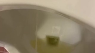 Pissing and jerking in public urinal