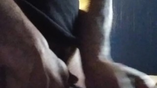 Jerking with a condom on