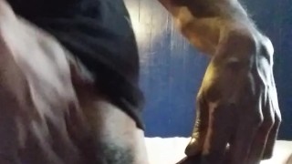Jerking with a condom on