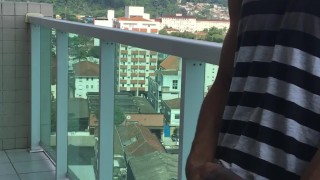 The public jack off on the balcony of the building.
