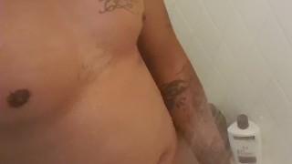 In the shower stroking my cock 