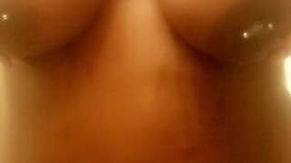 Sexy ebony playing with her tits
