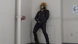 masked leather man quickly shoots his load in hotel stairway