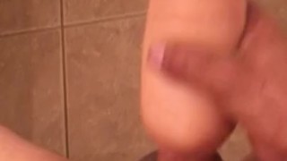 Stroking big cock with Sasha Grey toy