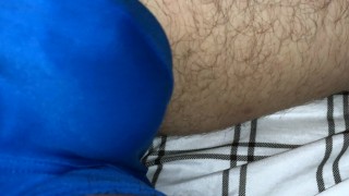 Jock rubbing his big cock under desk getting it hard