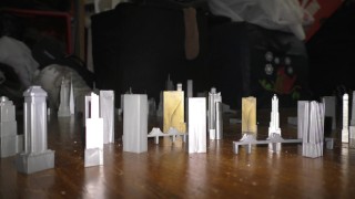 Towering Titan in Black Patent Stiletto Boots (Teaser)