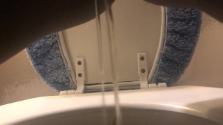 Peeing in the toilet and dripping pussy