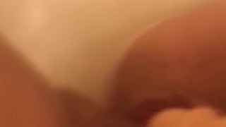 Teasing my pussy with my dildo in the tub
