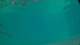 Underwater swimming with jockstrap in hotel pool