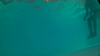 Underwater swimming with jockstrap in hotel pool