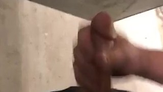 Horny guy jerks off at work
