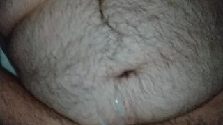 hairy bear cums on belly