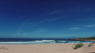 PISS PISS TRAVEL - Sasha smiles and pisses merrily on the public beach