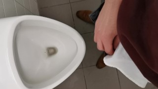 Horny uncut teen jerking and cumming at public school urinal