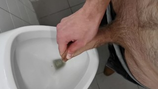 Horny uncut teen jerking and cumming at public school urinal