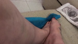 rubbing my feet playing with my pussy with a vibrator... feels good!