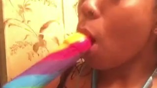 Star phlame sucking a lollipop