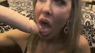 Brandi Love deepthroats a dildo and shows off her big, beautiful tits