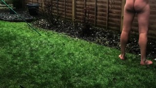 Naked guy in garden