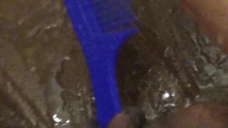 Masturbating with my blue comb when taking shower