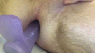 Boy plays with dildo