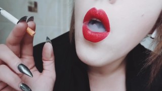 MISTRESS WITH LUSCIOUS RED LIPS CLOSE-UP SMOKING CIGARETTE