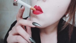 MISTRESS WITH LUSCIOUS RED LIPS CLOSE-UP SMOKING CIGARETTE