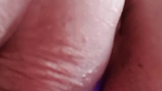 Masturbating