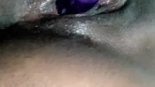Ebony lesbian playing in that fat pussy with toy